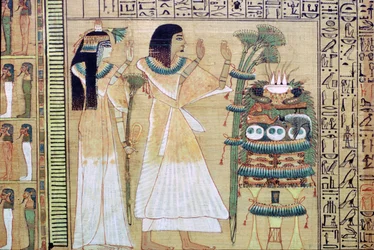 Muž a jeho žena přinášející oběti Osirisovi z Egyptské knihy mrtvých