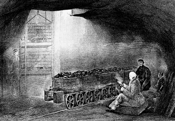 Dno jámy v uhelném dole s vlakem naložených vozů, 1860