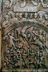 Detail listu byzantského diptychu ze slonoviny zobrazující muže a medvědy v cirkuse.