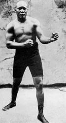 Jack Johnson, první černošský mistr světa v boxu v těžké váze, 1908, 1951