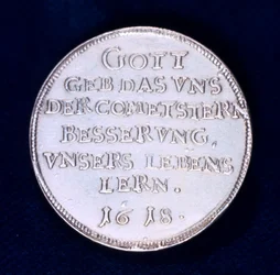 Rub medaile připomínající zářivou kometu z listopadu 1618