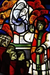 Vitráže zobrazující Dona Bosca v kostele Notre-Dame-de-la-Trinite, Blois, Francie