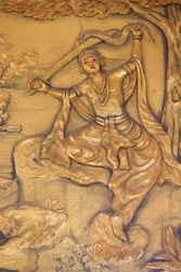 Buddhistická pagoda Chua Thiep Long. Velké ostříhání: Buddha si mečem odřezává vlasy. Poté vyměnil své princovské šaty za žebrácké roucho. Pak zahájil své hledání osvícení. Tay Ninh. Vietnam