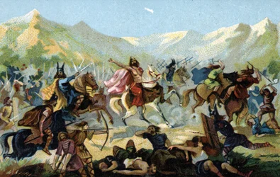 Franský král Klovis I. (466-511) v bitvě u Tolbiaku v roce 496 proti germánskému kmeni Alamanů slíbil, že v případě vítězství konvertuje. Konec 19. století (chromolitografie)