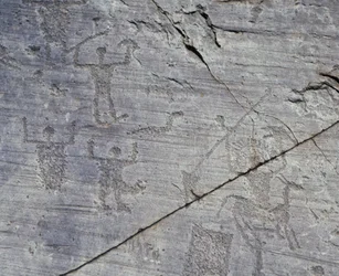 Itálie, region Lombardie, Valcamonica, detail skalních kreseb v Národním parku Naquane
