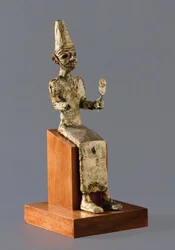 Sedící figurka Baala, kanaánského boha války, Megiddo, kolem roku 1300-1200 př. n. l.