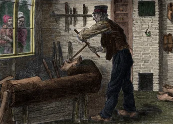 Diverzant při práci ve své dílně v Belgii, In „“Le journal de la jeunesse 1888““.