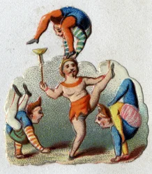 Cirkus: contorsionists a balancers vykonávající číslo.
