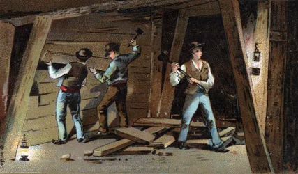 Uhelný důl ve Francii na konci 19. století: Dřevěná štola. Chromolitografie konce 19. století