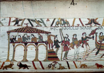 Harold je poslán anglickým králem Edwardem Vyznavačem do Normandie, aby informoval vévodu Viléma Dobyvatele (1027-1087), že bude jeho nástupcem Anglické koruny: poslední jídlo na souši před naloděním do Normandie Detail tapisérie z