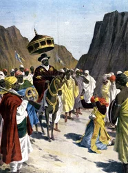 V Borumiedě se Ras Mangacha, guvernér provincie Tigrai (Tigray) v Habeši, podřídí Negusi Menelikovi II (1844 - 1913) s kamenem na krku. 1899. Ill. Silueta pro tisk.