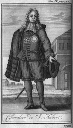 Rytířské řády. Rytíř svatého Huberta vévodovi z Juliers v 15. století In „Historie vojenských řádů neboli rytířů, světských i řádových milicí obou pohlaví, které byly dosud ustaveny. Vydání převzato od Abbe Giustiniani, R.
