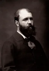 Umělec Jean-Jacques Scherrer fotografovaný u příležitosti pařížského salonu v roce 1881