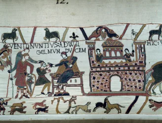 Poslové normandského krále Viléma Dobyvatele (1027-1087) ho informovali, že Harold, který přišel z Anglie jménem anglického krále Edwarda Vyznavače, byl zajat hrabětem Guyem de Ponthieu Detail tapiserie z Bayeux neboli Emb