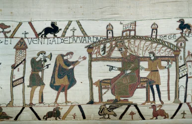 Harold, který se vrátil do Anglie, po svém velvyslanectví u vévody Viléma Dobyvatele (1027-1087), recitoval svou cestu králi Edwardu Vyznavači Detail tapiserie z Bayeux nebo výšivky královny Mathildy