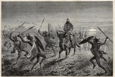 Eskort přidělený cestovateli Bakerovi před odjezdem k jezeru Albert (nebo Albert Nyanza) předvádí fantazii. Engravure pour illustration le voyage au lac Albert, en 1861-1864, od Sir Samuel White Baker, v „Le tour du monde, nouveau journal des voyag