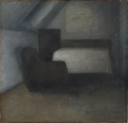 Pokoj v podkroví se stolem a židlí
