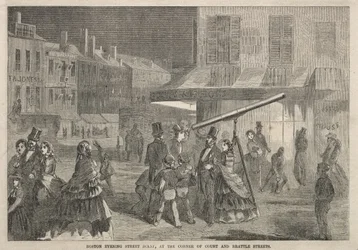 Bostonská večerní pouliční scéna na rohu ulic Court a Brattle Street