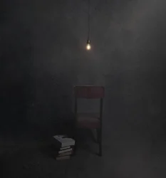 Temná místnost, prázdná židle